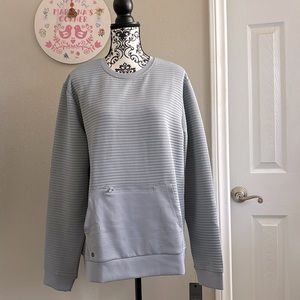 Blue sweatshirt with front zipper and kangaroo pocket. Very comfortable.